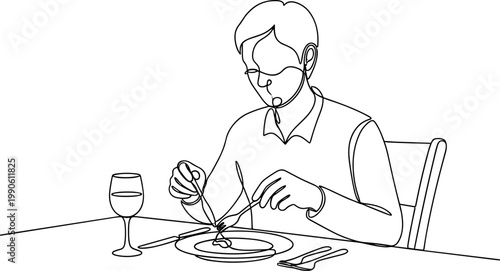 Man eating at a restaurant table.