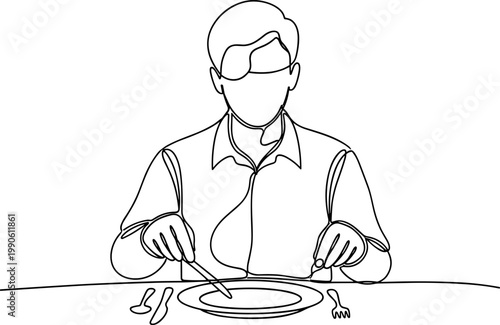 Man eating with fork and knife.