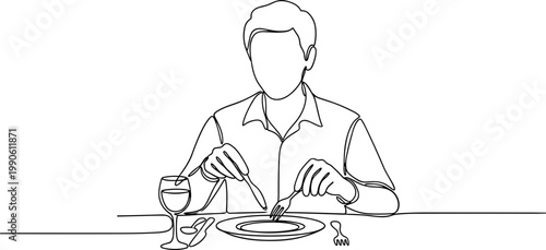 Man eating with knife and fork.