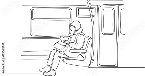 Person sitting alone on train seat.