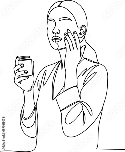 Woman applying cream to face skin.