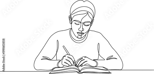 Woman studying with a book and pen.