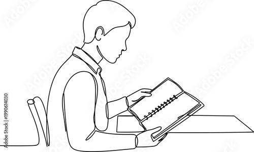 Young man reading a book.