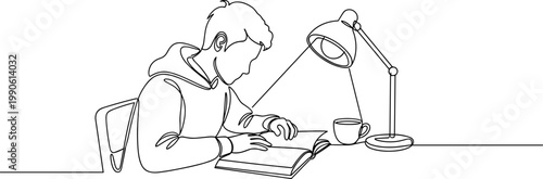 Young adult man working on laptop.