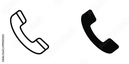 Photos Contrasting designs of a classic telephone handset icon in black and white outli