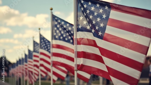 Multiple American flags fluttering outdoors with shallow depth of field and vintage tone