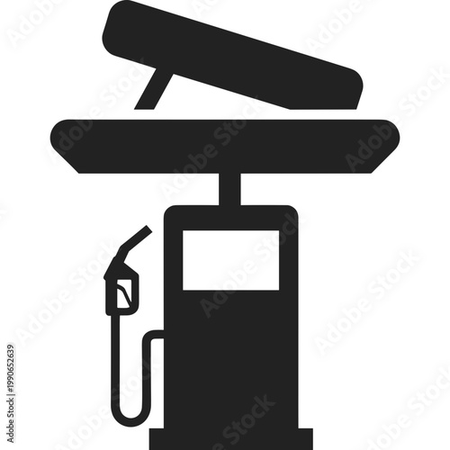 A fuel pump with a nozzle sits under a canopy at a station.