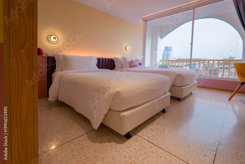 Stylish Bedroom Interior with Art Deco Accents and a Playful Lips Pillow.