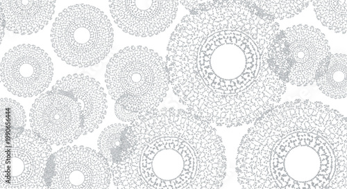 Abstract circular patterns composed of small dots, creating a textured, radial effect