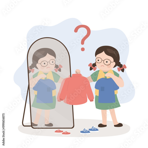 Cute kid girl choosing clothes, child trying on new clothes in front of mirror. Caucasian girl thinking about buying sweatshirt. Shopping, choice, wardrobe concept.