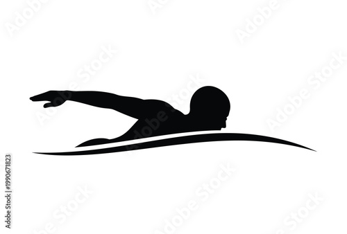 A swimmer in motion captured as a striking black form silhouette