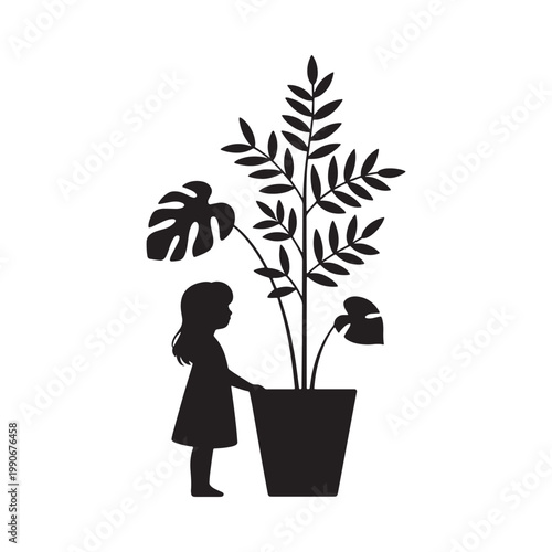 Silhouette of a child admiring a large monstera plant in a pot