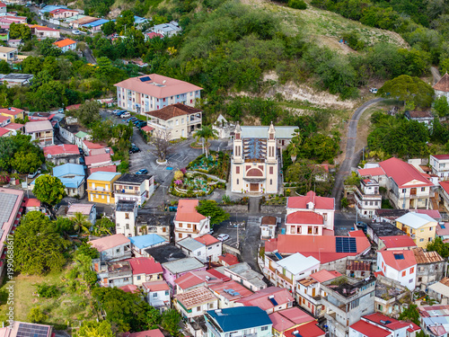 aerial landscape view of central part of Le Prêcheur,  a coastal village and a commune of French overseas department of Martinique, located at islands  northwestern coast with Saint Joseph Church