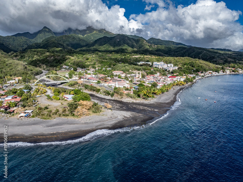 aerial landscape view of Martinique coastline with coastal village Le Prêcheur, with Pont du Prêcheur crossing 