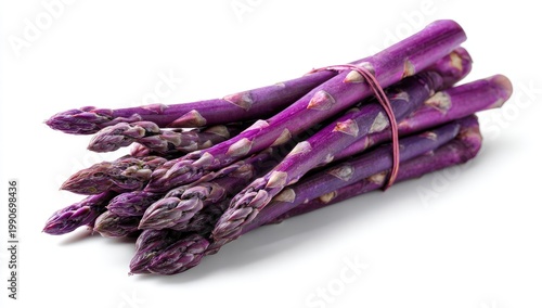 Bunch of vibrant purple asparagus stalks tied with a rubber band