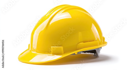 Bright yellow hard hat on a white background, ready for protective wear