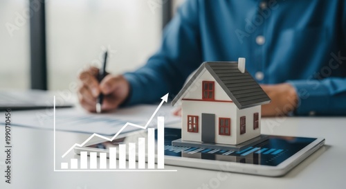 Real estate investment growth with house model and financial graph investment financial property