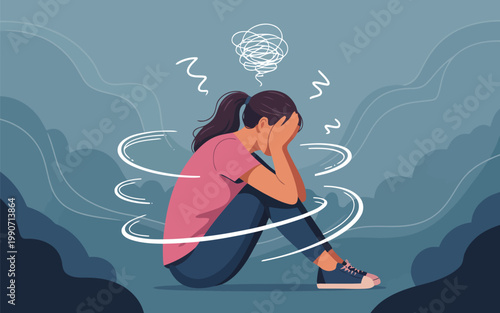 Stressed young woman sits on the floor with her face hidden, experiencing deep emotional turmoil and anxiety