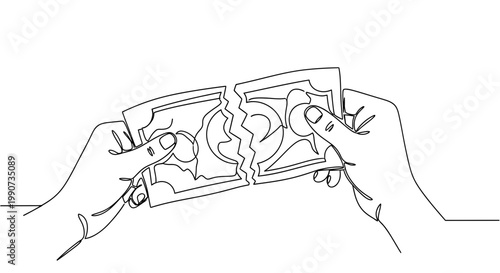 Hands holding broken credit card.