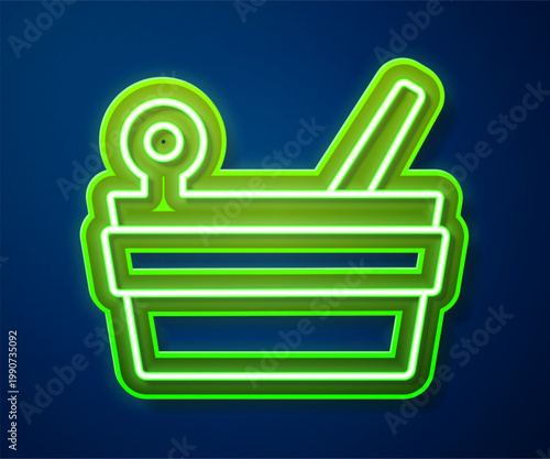 Glowing neon line Sauna bucket and ladle icon isolated on blue background. Vector