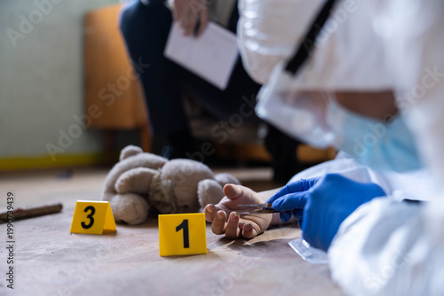 Konstfotografi Forensic team investigating a grim crime scene, collecting evidence around a chi