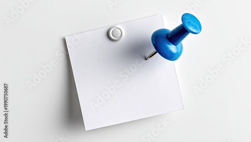 Blank white square paper note secured with a blue pushpin on white background