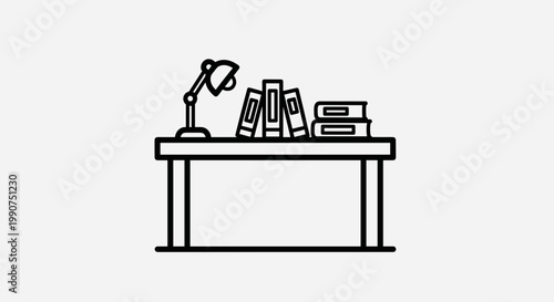 Desk with books and a lamp.