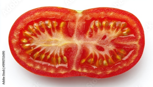 A halved Roma tomato reveals vibrant red flesh, seeds, and juicy pulp