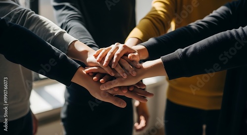 Teamwork and Unity - Hands Stacked Together in a Circle of Support.