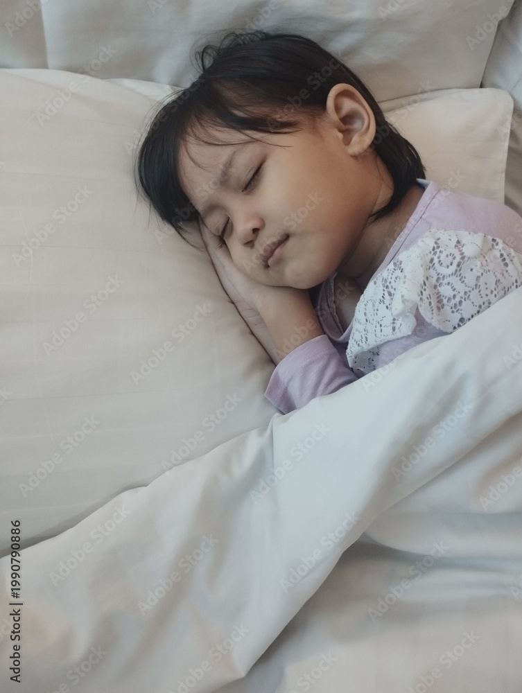 Obraz premium Sleeping Child Peaceful Rest Healthy Sleep Concept for Kids