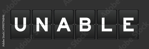 Black color analog flip board with word unable on gray background