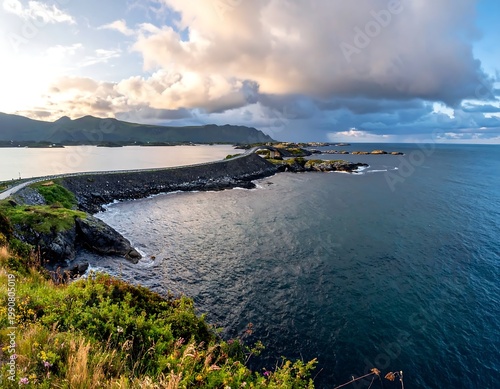 Storseisundet Bridge On Atlantic Ocean Road In Norway Under Dramatic Sunset With Dark Storm Clouds And Golden Light Over The Rocky Coastline