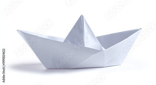 Simple white paper boat, a childhood classic, casts a soft shadow