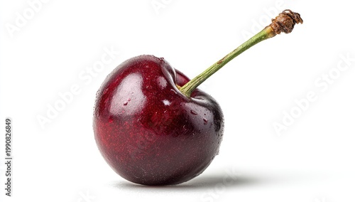 A single, glossy, dark red cherry with a green stem on a white background