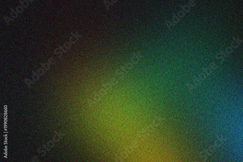 Abstract color blend with grainy texture green yellow blue and red.