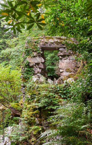 Remains, ruins of a stone arch in a natural park.