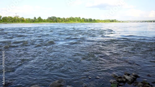 the flow of water in a river in the city