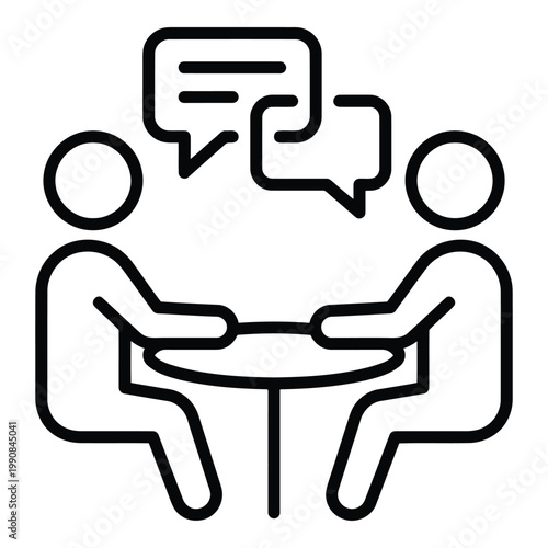 Two People Talking at Table Meeting.