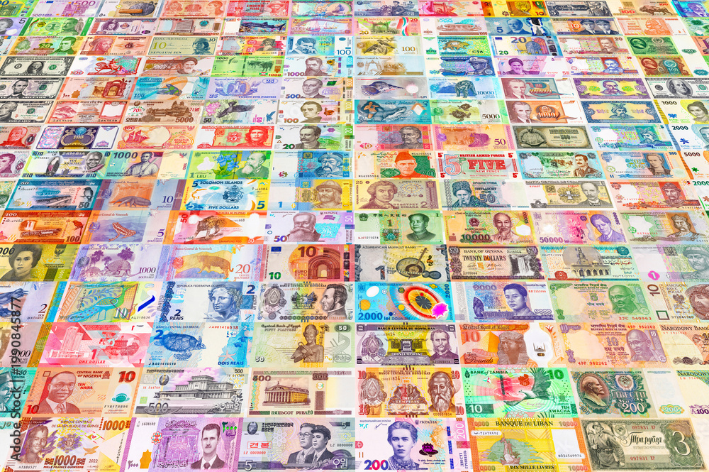 Fototapeta premium Money from different countries of the world. Mosaic of paper money. Background of money