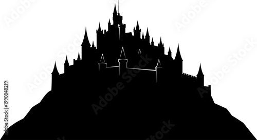 Medieval castle silhouette standing on a high mountain peak