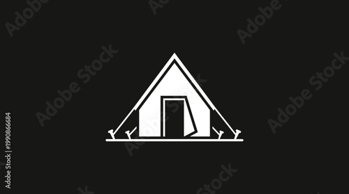 Four people setting up a triangular tent outdoors in daytime