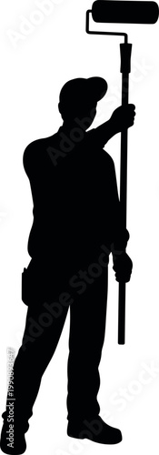 Person using a roller to paint a wall indoors