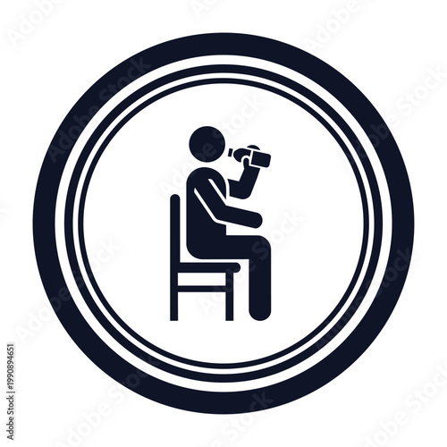 A person sits on a chair holding a camera to their face inside a large circle.