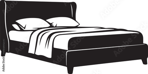 Black and white of a bed with a blanket and two pillows