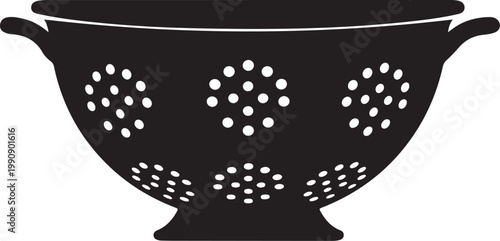 Black colander with white holes on white background kitchen