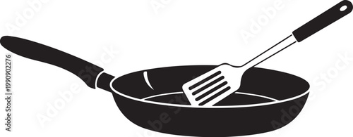Black frying pan with spatula kitchen utensil cookware