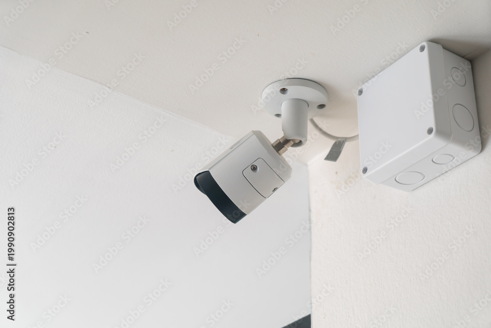 Obraz na plátně Surveillance Camera Mounted on Ceiling