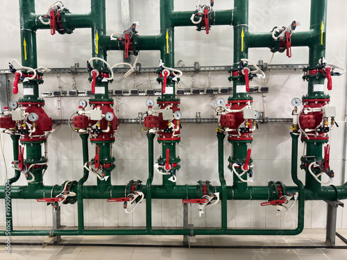Fotografie Industrial fire sprinkler system control valves and piping manifold