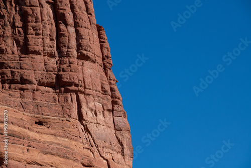 Vertical Red Rock Wall with Blue Sky Copy Space in Sedona, Arizona