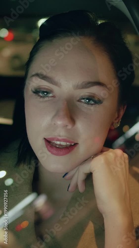 Young Beautiful Businesswoman Talking In The Taxi